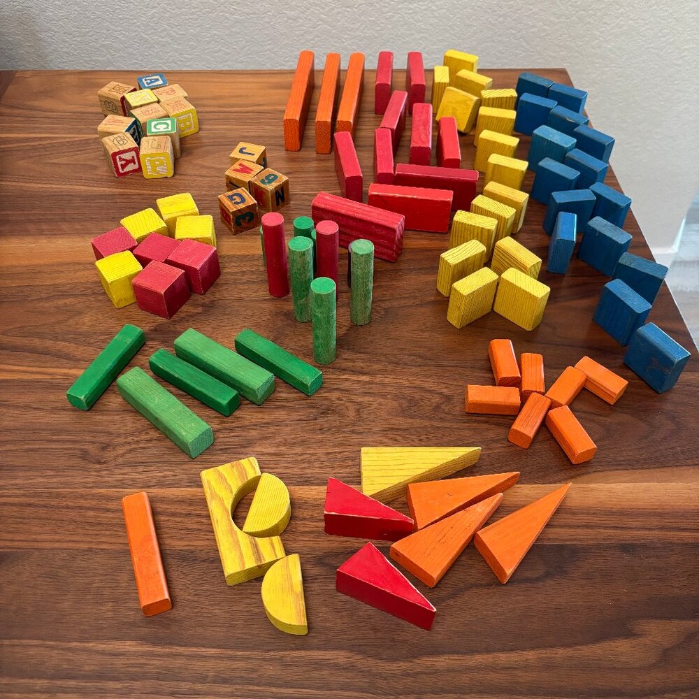 Colorful set of wooden blocks in many shapes